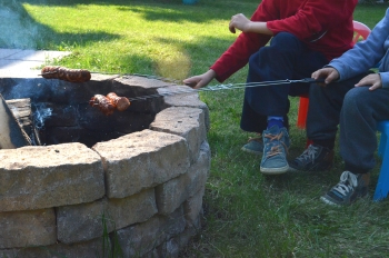 people grilling food 